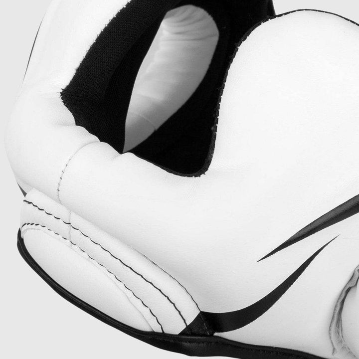 Close-up on cheek padding with reinforced black stitching and sleek side accent.