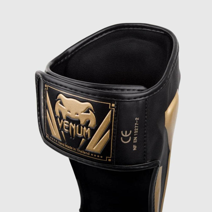 Rear strap close-up with patch label and craftsmanship detail.