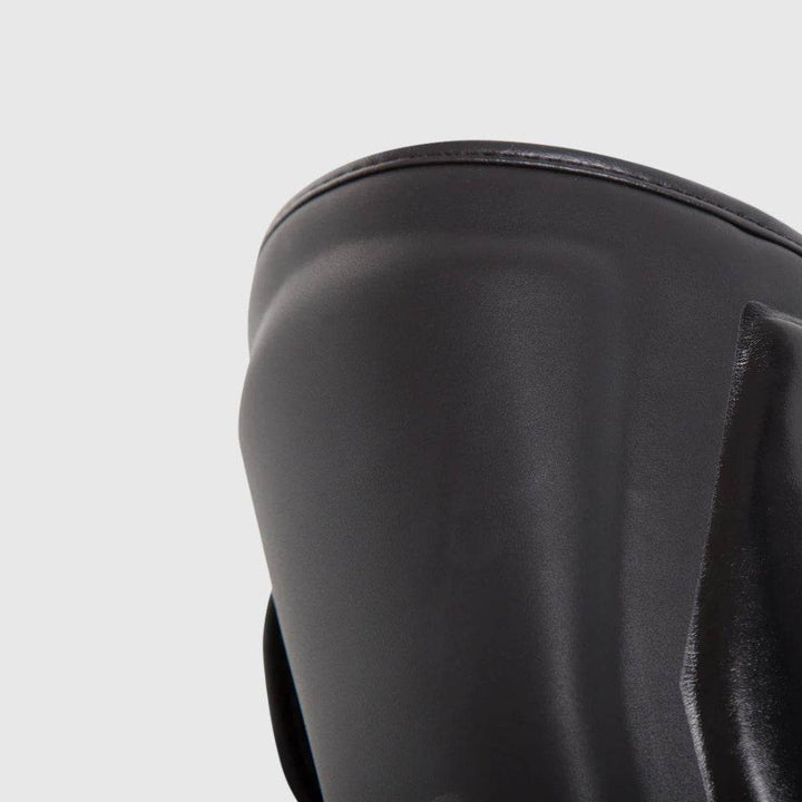 Close-up of upper padding area showing solid matte finish and rounded edge.