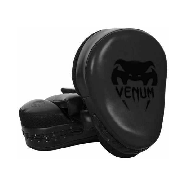 Pair of Venum black curved focus mitts with a matte finish, featuring a subtle glossy black Venum snakehead logo and branding on the striking surface.