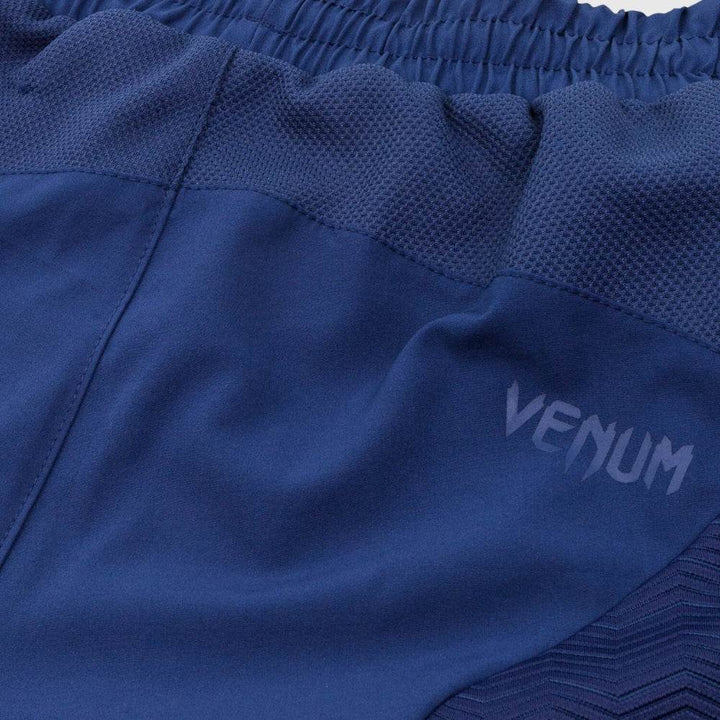 Rear waistband close-up showing the Venum wordmark logo above the mesh performance panel.