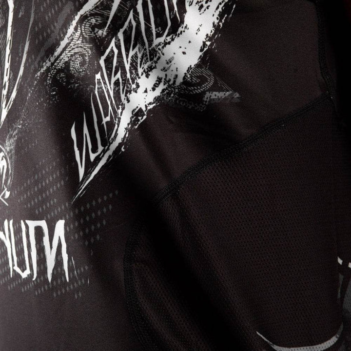 Detailed fabric texture and "WARRIOR" text in distressed white print on the side panel.