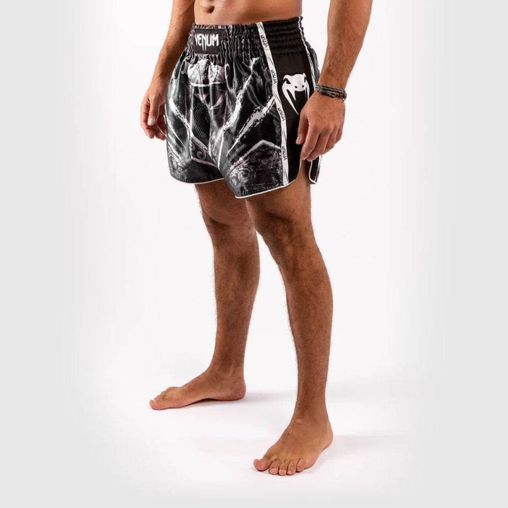 Angled front-side view with visible leg graphics and white Venum branding.