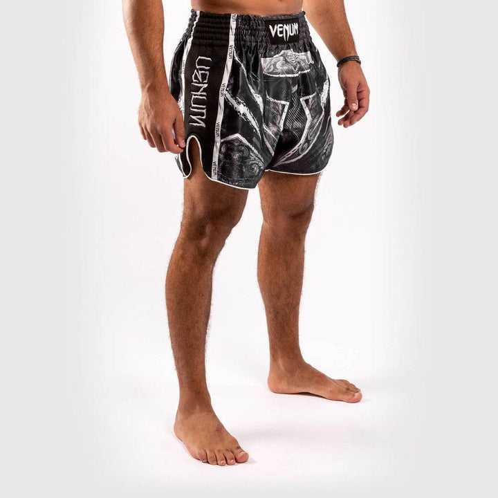 Alternate angled view showing white vertical "VENUM" text along the side mesh panel.