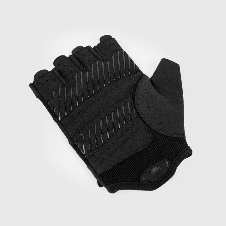 Close-up of a single Venum Performance glove's palm side, highlighting grip texture and ergonomic padding.