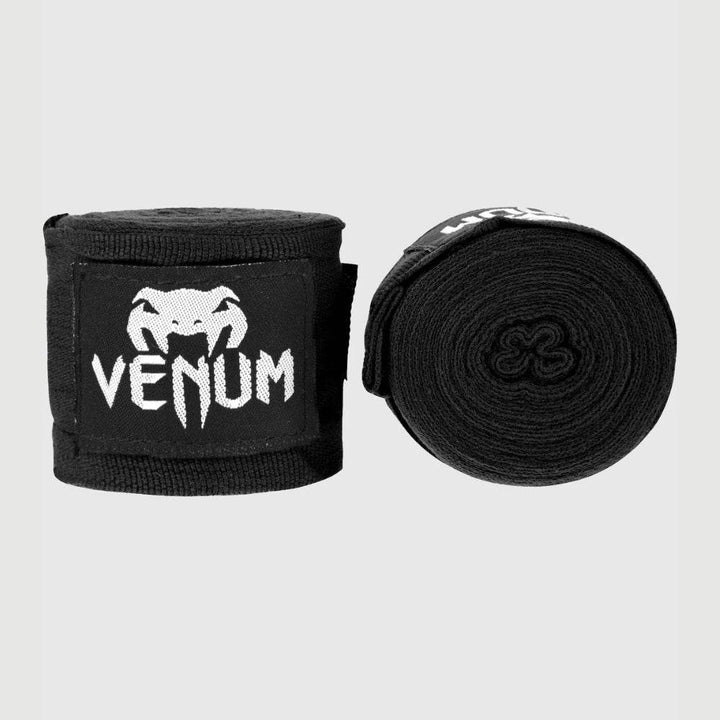 Black handwraps with white Venum logo, rolled and unrolled.
