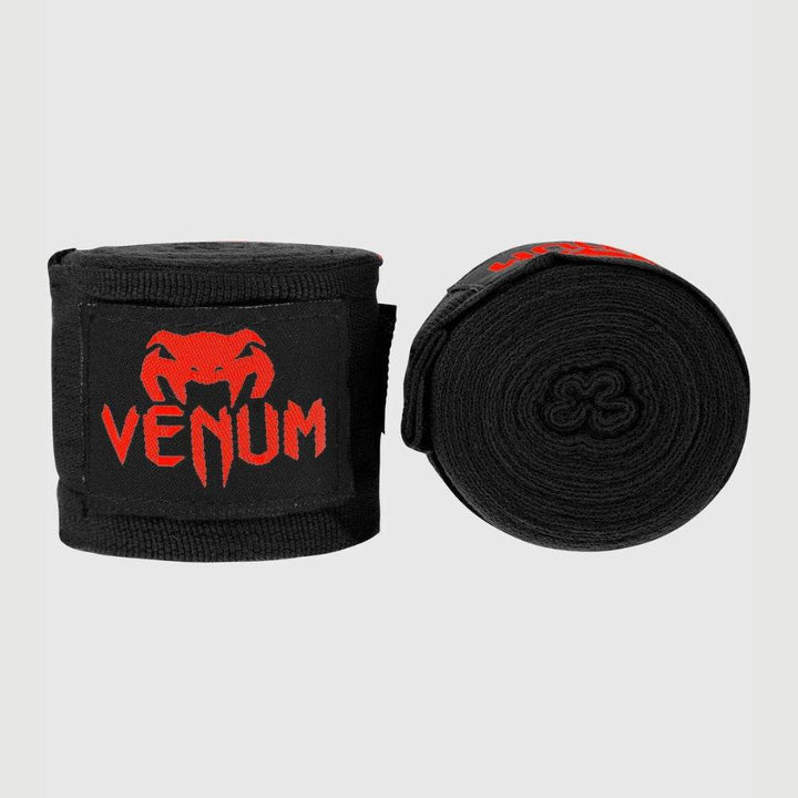 Solid black handwraps with red branding, dual-roll view.