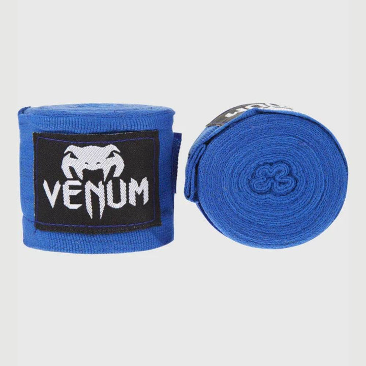 Blue handwraps with white logo patch, rolled and side-by-side.