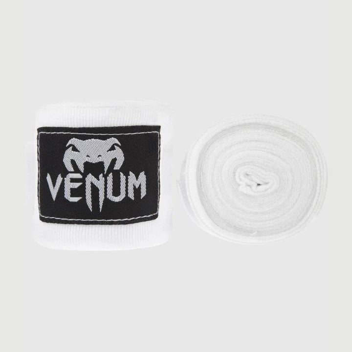 White handwraps with black Venum patch.