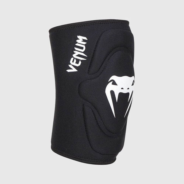 Black Venum knee pad with ergonomic padding and a prominent white Venum snakehead logo, displayed from a front-angle view.