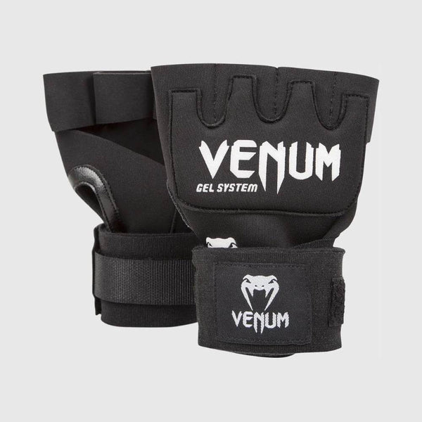A pair of black Venum Kontact gel glove wraps displayed upright with visible VENUM logo and "Gel System" label on the knuckle padding.