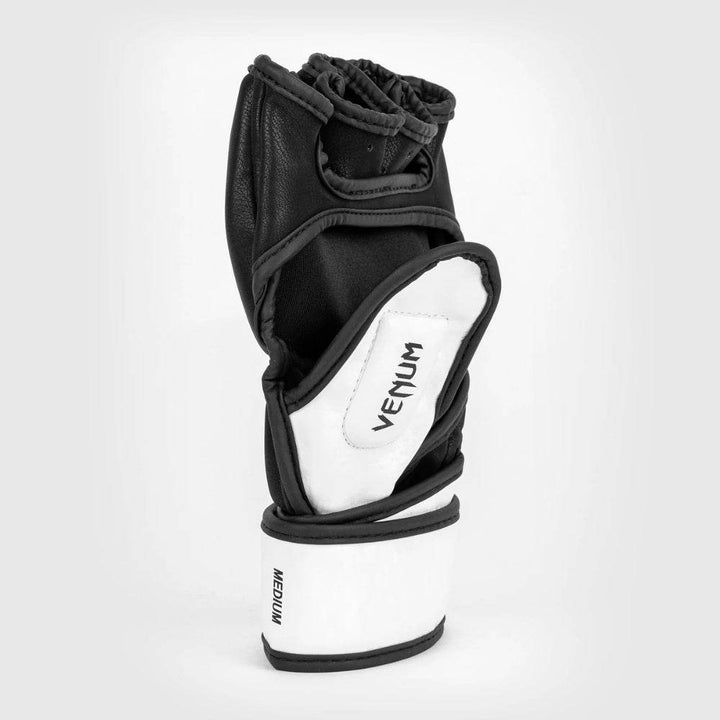 Side angle of the open-palm design with visible white padded insert, elastic finger loops, and stitched Venum branding for grip and ventilation.