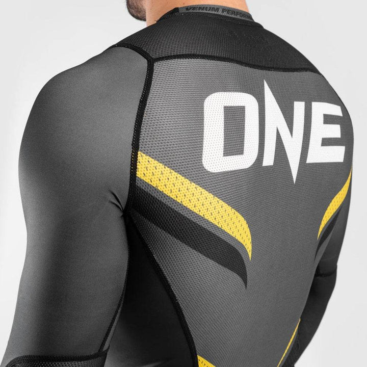 Detailed shot of the ONE logo and mesh texture around the upper back and shoulder area.