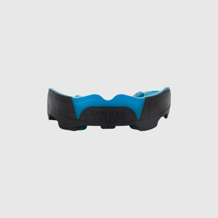 Close-up of Venum Predator mouthguard front, with blue inner layer and black exterior, logo embossed at the center.