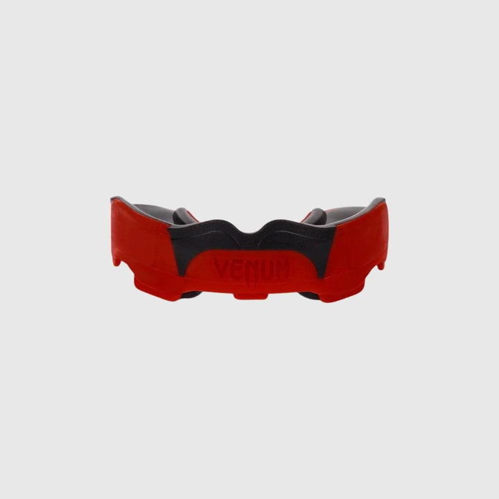 Direct front-facing image of the red and black Venum Predator mouthguard with visible central Venum branding.