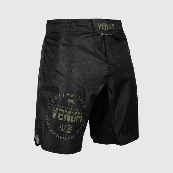 Right leg angle showing circular graphic with "Fighting Spirit" and other text.