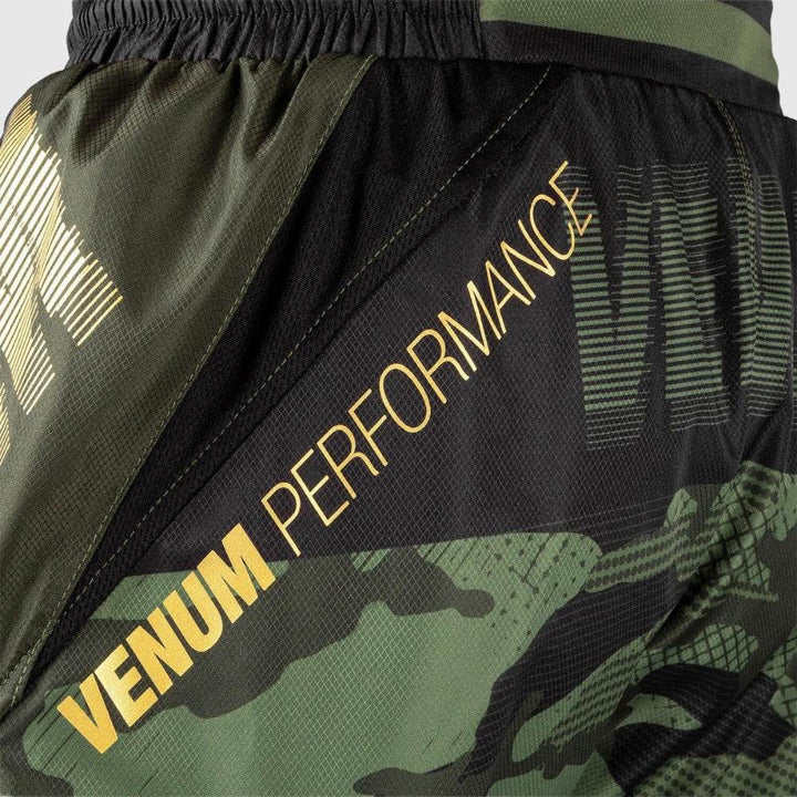 Close-up of "VENUM PERFORMANCE" text over camo mesh detail on the rear.
