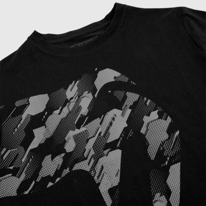 Detail shot of the camo-textured snakehead Venum logo print on the front.