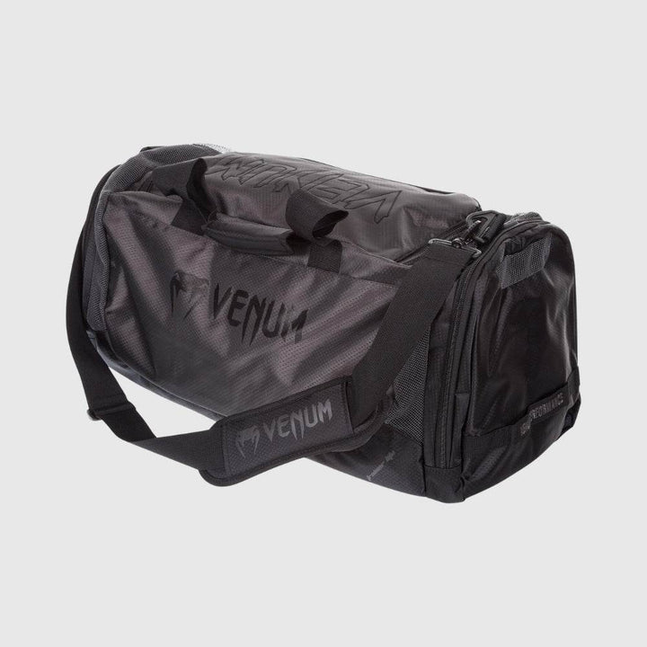 Back view of the Venum Trainer Lite Sport Bag showcasing spacious main compartment and ventilated side panel.