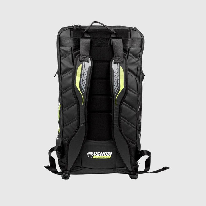 Back view of the Venum backpack showcasing padded shoulder straps with reflective graphic detailing and VENUM TRAINING CAMP logo on the lower back panel.