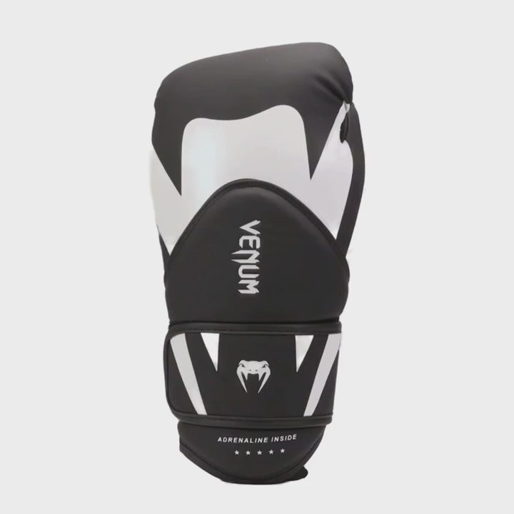 360 video of a single Venum Challenger 4.0 glove in black and white with vertical Venum logo and stylized snake branding on wrist.